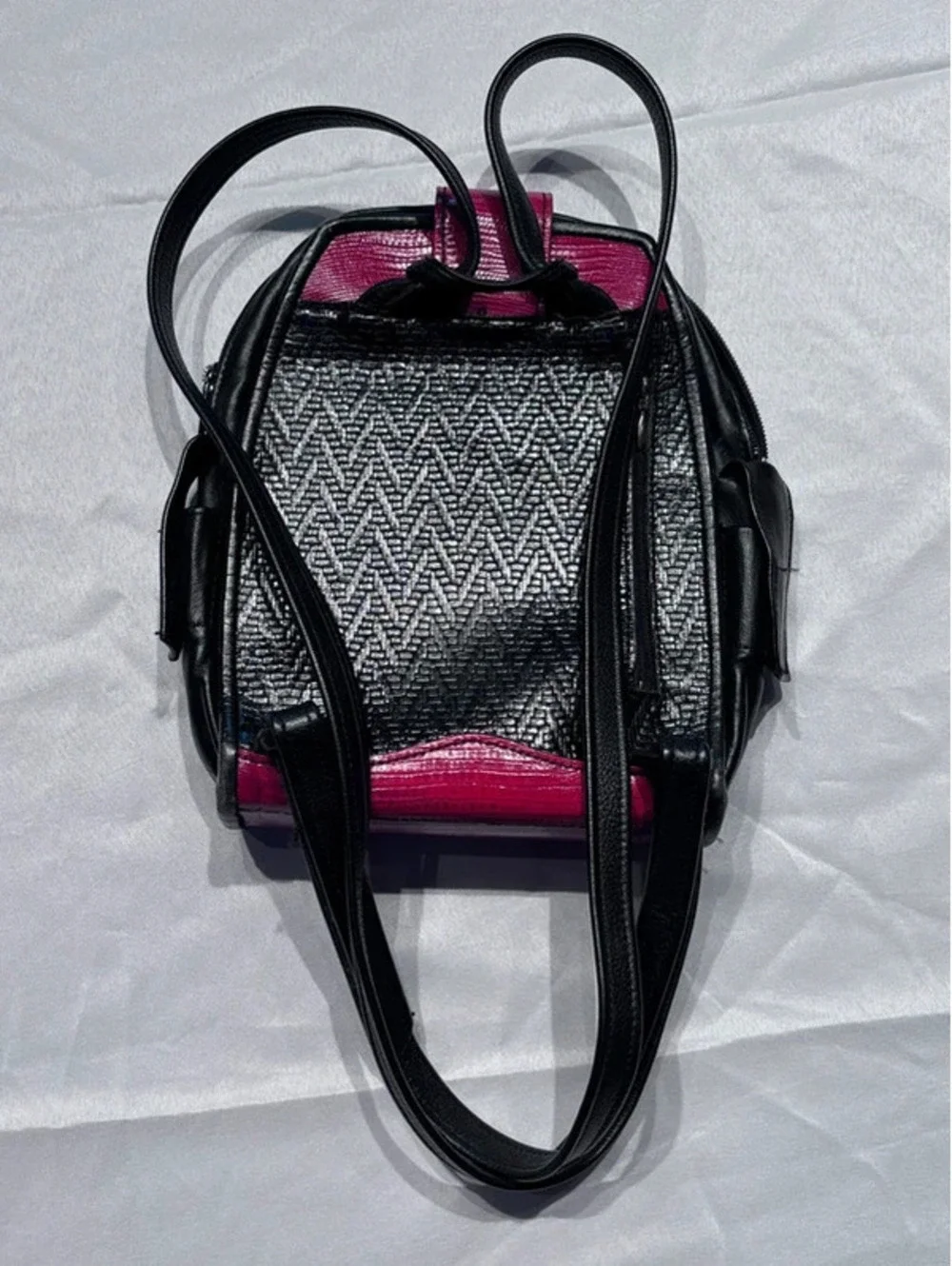 A Vintage Roche Leather 2002 Fuchsia & Black Textured Backpack